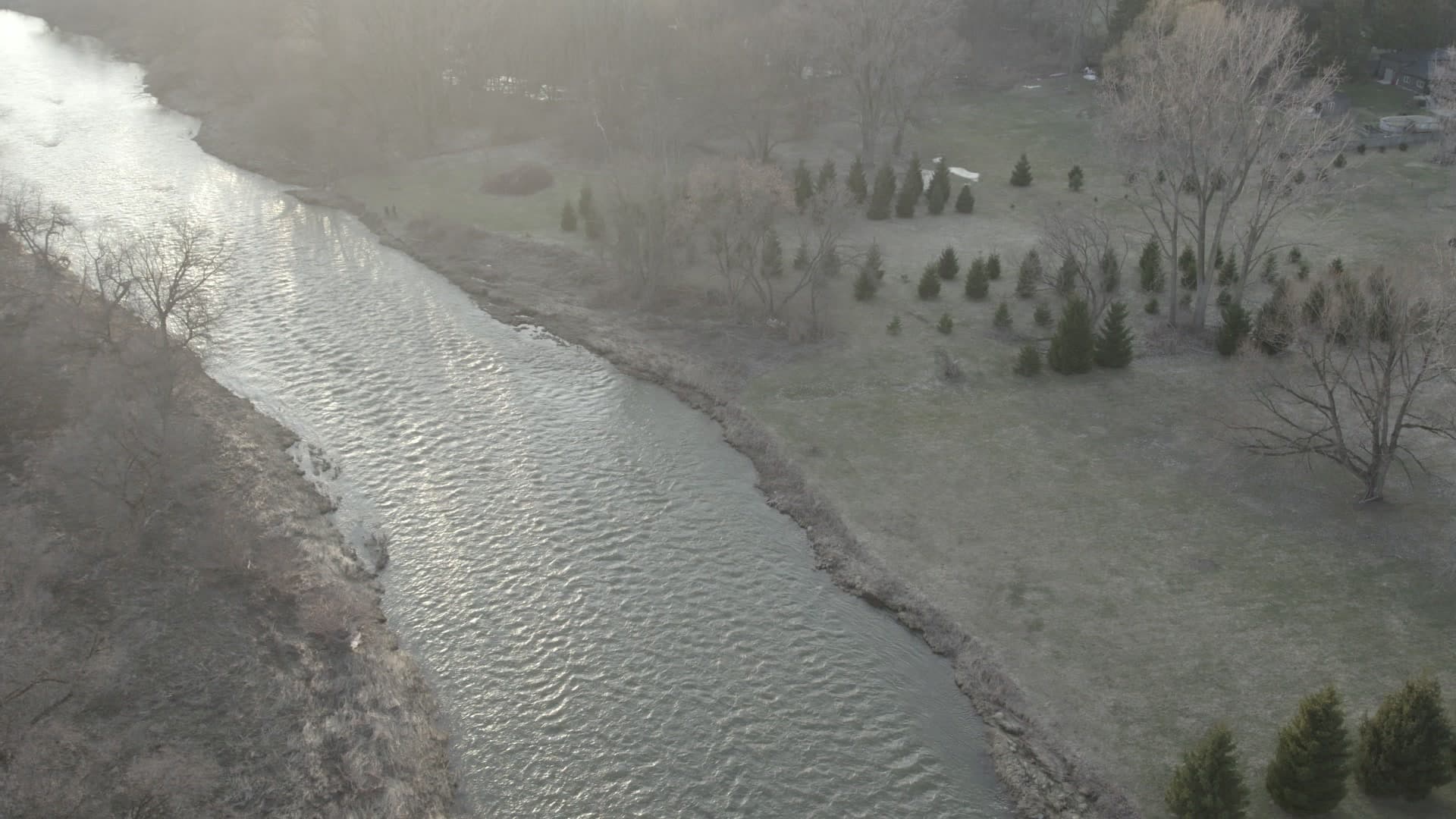 Aerial sunset drone shot over Mohawk Territory river near Deseronto, Ontario — Mohawk Medibles territory